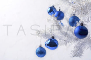 White Christmas Tree with Blue Ornament Copy Space for Holidays